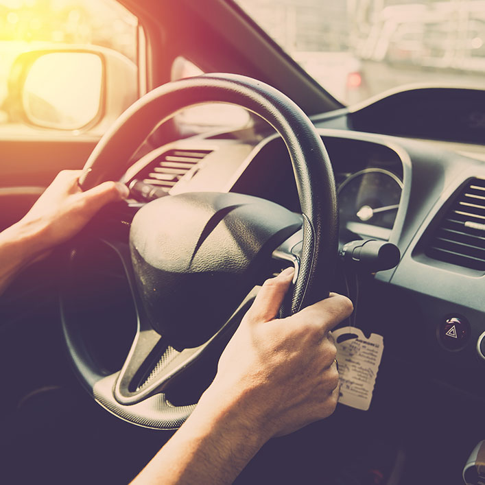 hands on steering wheel